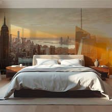 Panorama-urbano-nella-luce-dorata-del-tramonto-carte-da-parati-architettura-carte-da-parati-demural